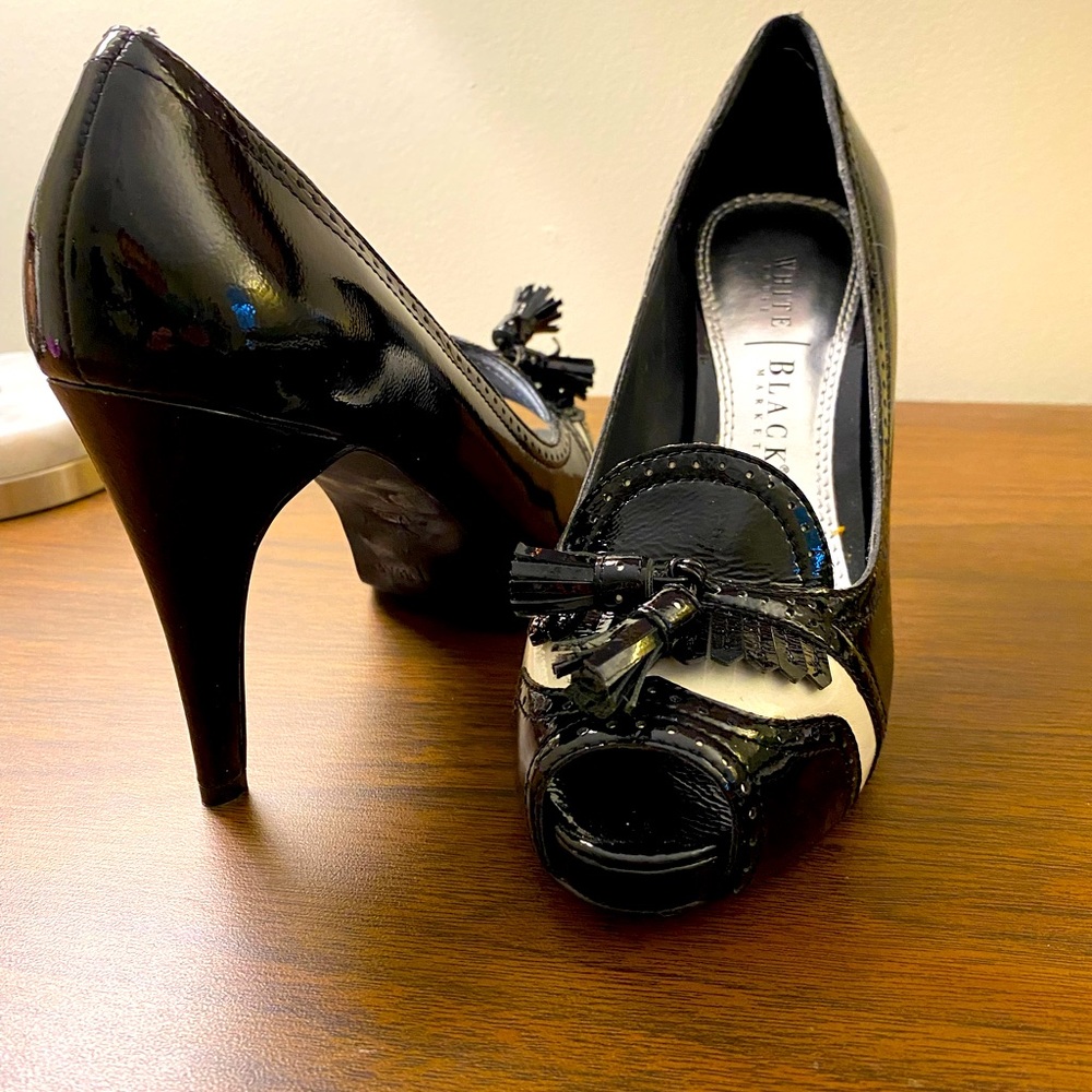 White House Black Market “Kate” 4-inch heels.  Size 7. Like new. Only worn once.